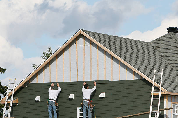 Professional Siding technician working in New Hill, NC